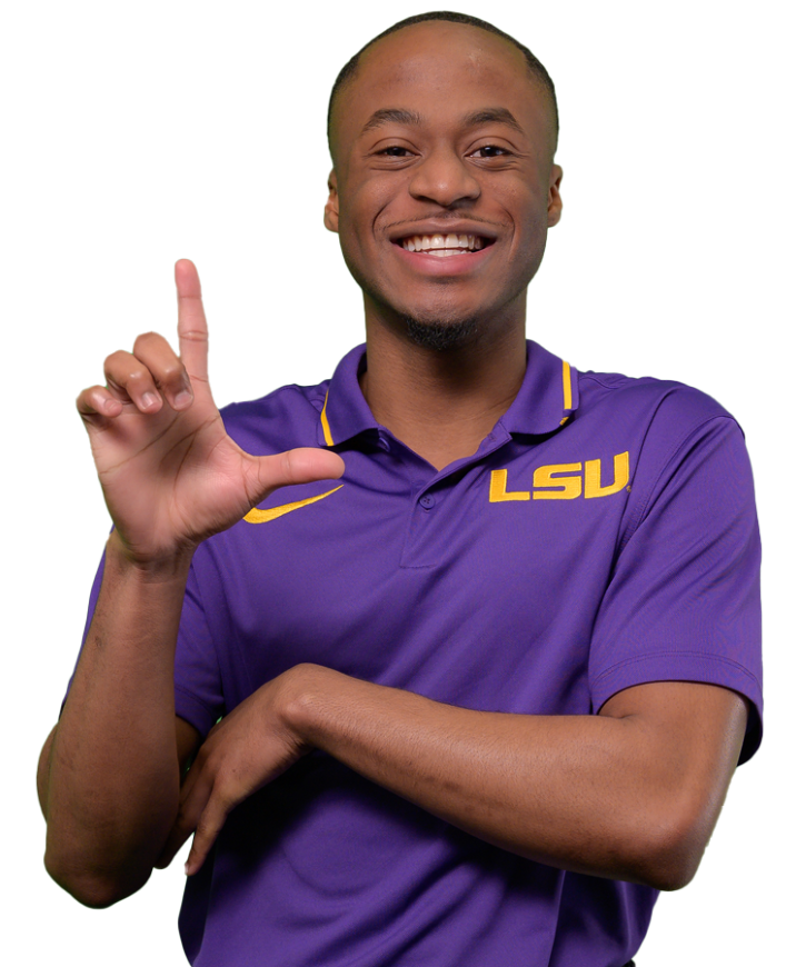 Clarence Magee hold hand in shape of an L, he is wearing a purple LSU shirt. 