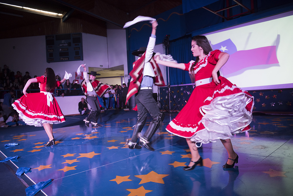 Chilean dancers perform on stage