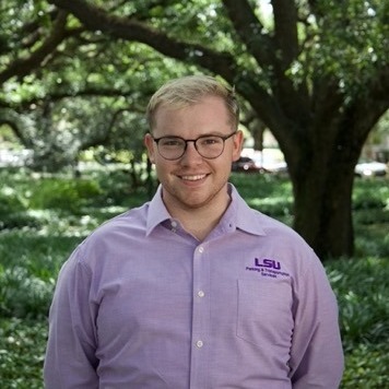 blonde man with glasses